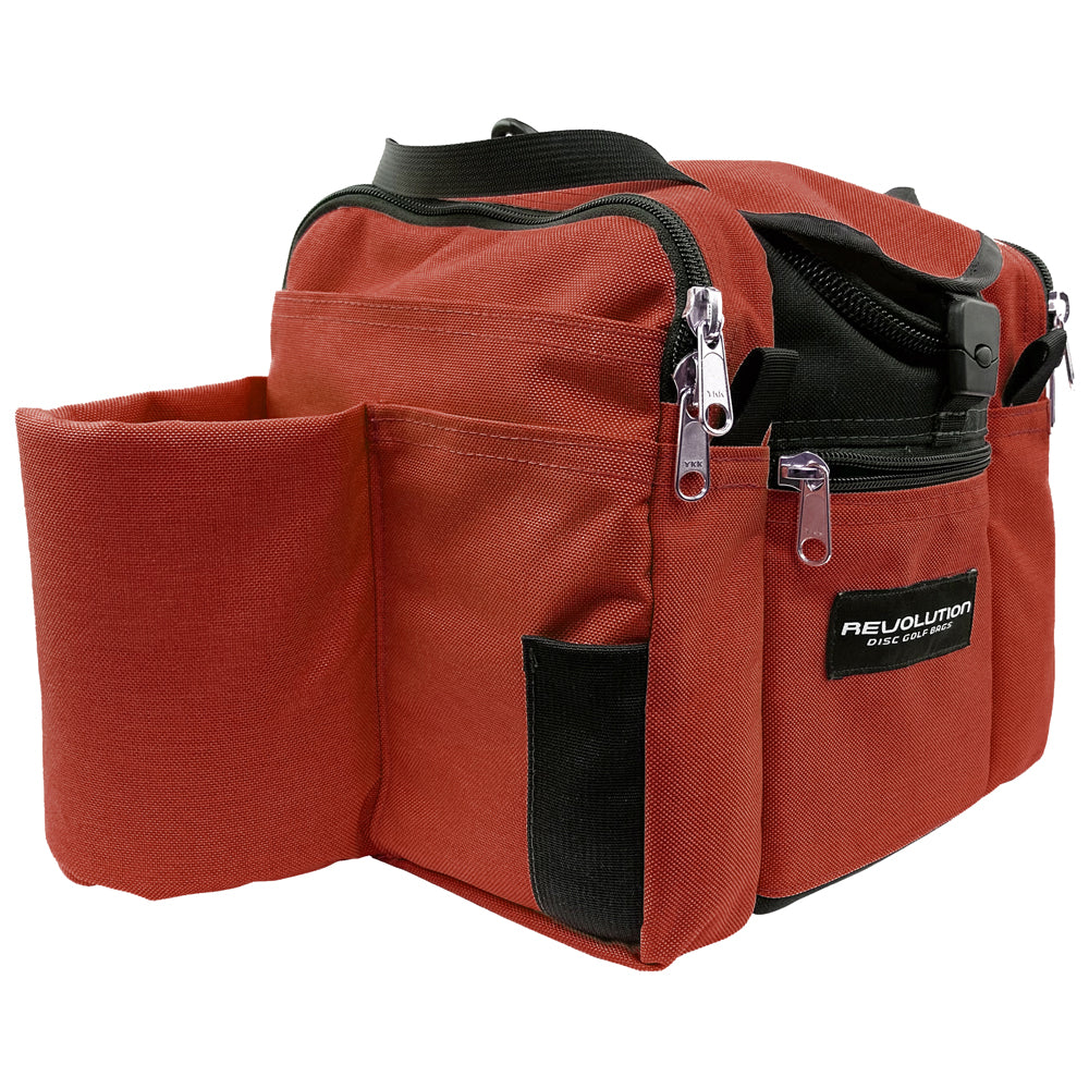 Gotta Go Gotta Throw Revolution Mini Deluxe V3 disc golf bag in rust color, compact bag with multiple compartments for discs and accessories.