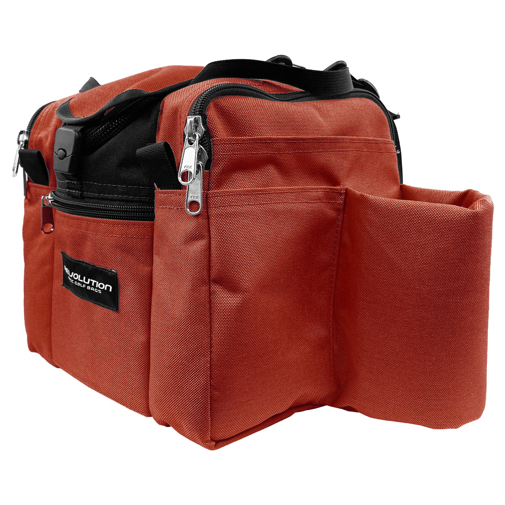 Gotta Go Gotta Throw Revolution Mini Deluxe V3 disc golf bag in rust with black accents, compact design with multiple storage pockets.