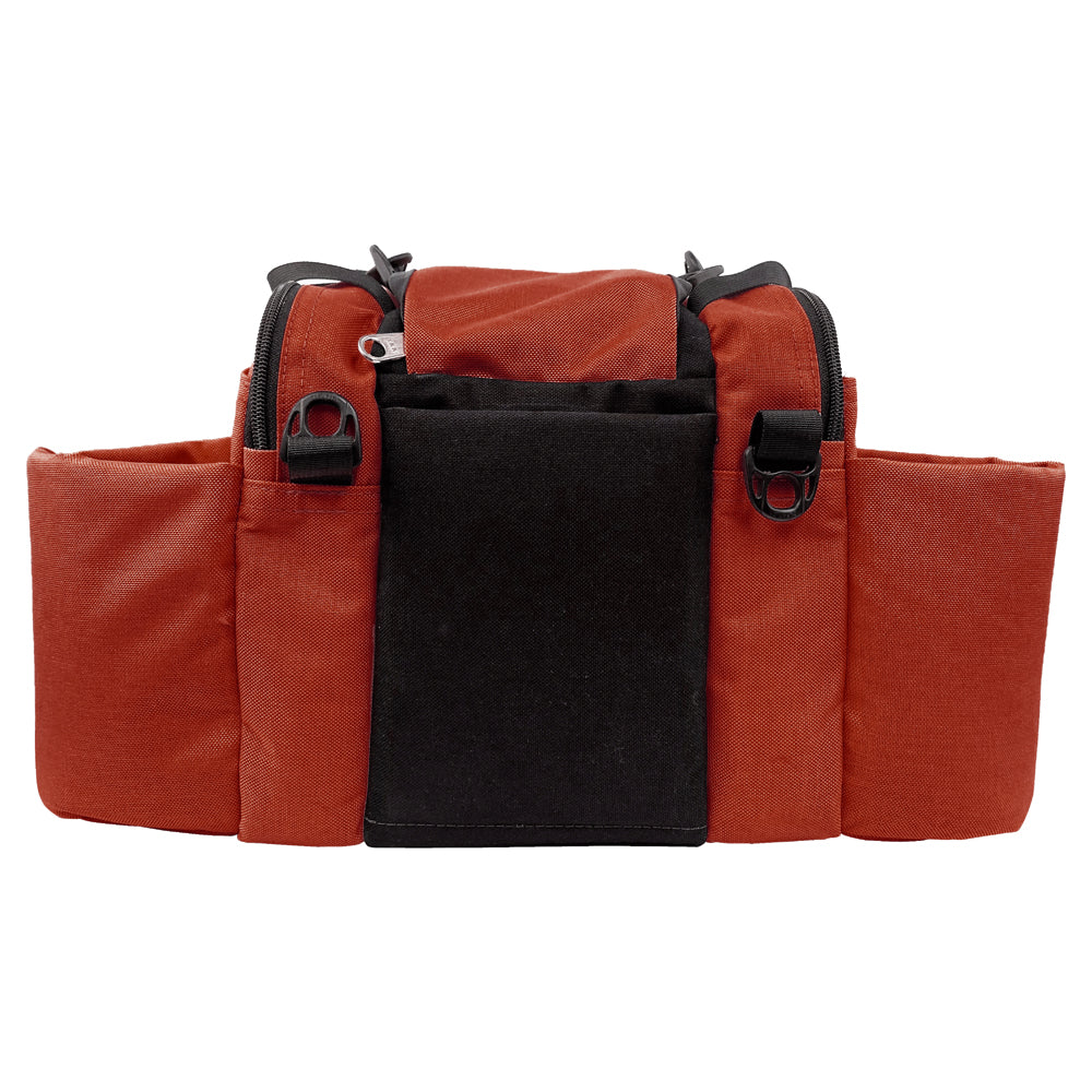Gotta Go Gotta Throw Revolution Mini Deluxe V3 disc golf bag in rust color, compact bag with multiple storage compartments.