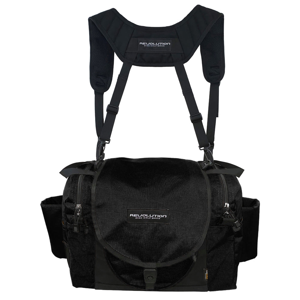 Gotta Go Gotta Throw Revolution Carolina Team V3 disc golf bag in black, featuring multiple compartments and adjustable straps.
