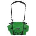 Gotta Go Gotta Throw Revolution Carolina Team V3 disc golf bag in forest green and black with multiple compartments and carrying straps.