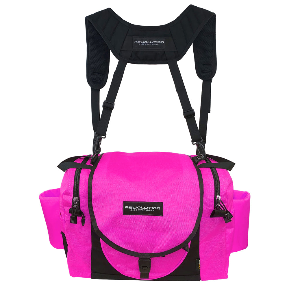 Gotta Go Gotta Throw Revolution Carolina Team V3 disc golf bag in bright pink and black, with multiple compartments and adjustable straps.