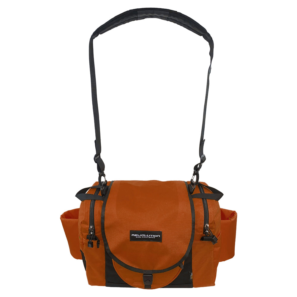 Revolution Carolina Team V3 disc golf bag by Gotta Go Gotta Throw in rust and black with multiple compartments and adjustable straps.