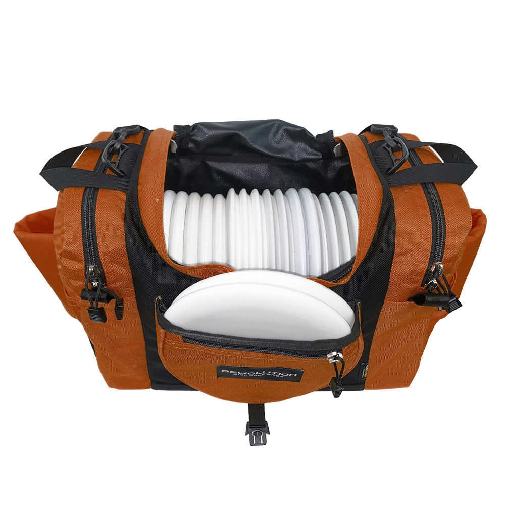 Gotta Go Gotta Throw Revolution Carolina Team V3 disc golf bag in rust with black accents, designed for carrying discs and accessories.