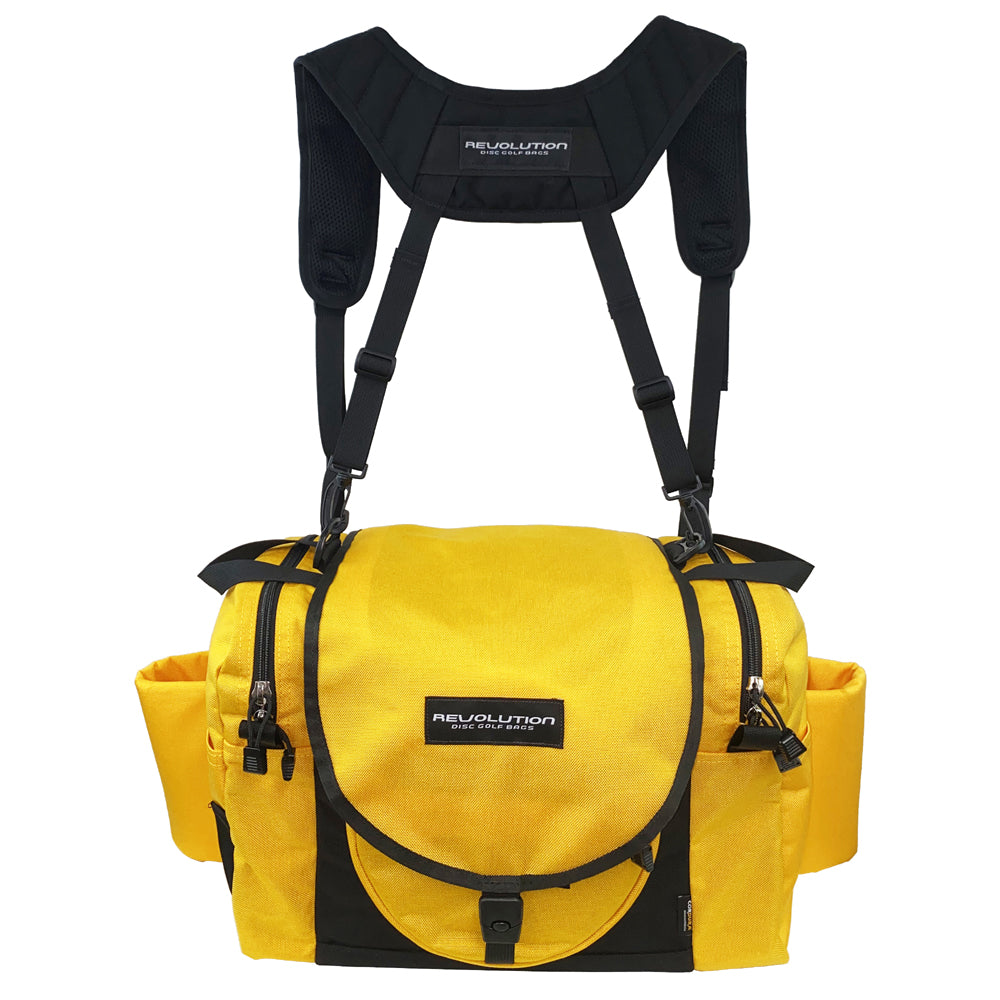 Gotta Go Gotta Throw Revolution Carolina Team V3 disc golf bag in yellow and black with multiple compartments and adjustable straps.
