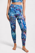 FisheWear Enchanted Grayling high-waisted leggings with a colorful rainbow ridge pattern, shown on a model.
