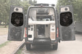 Alpine Van Works AVW Mid-Door Bags for storage, shown installed on a vehicle's rear mid-door for organized cargo space.