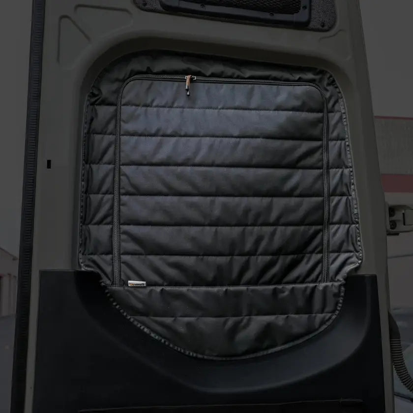 Canyon Adventure Vans CLIMA-SHADE™ insulated rear window covers set for enhanced privacy and temperature control.