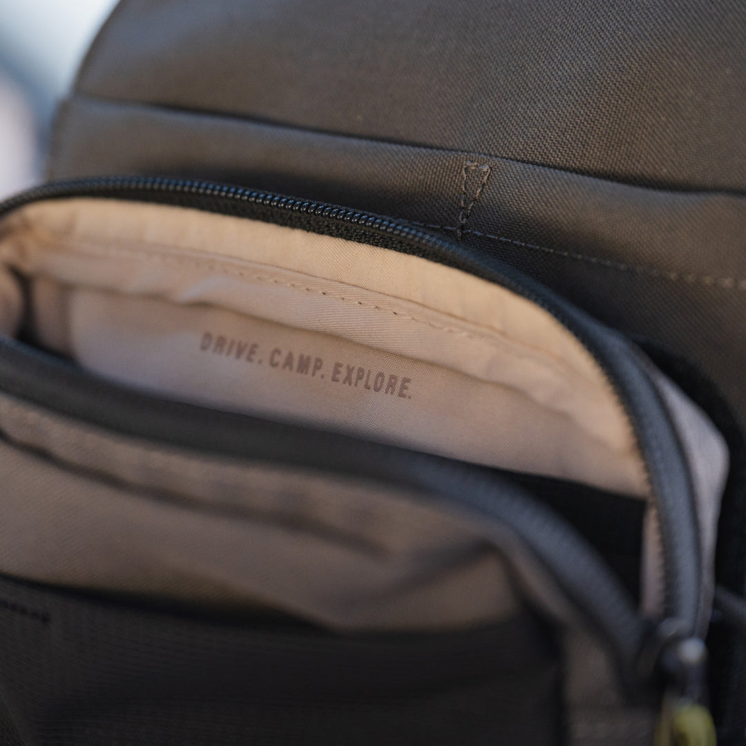 Luno® headrest organizer featuring multiple pockets for storing essentials in a vehicle, designed for easy access and convenience.