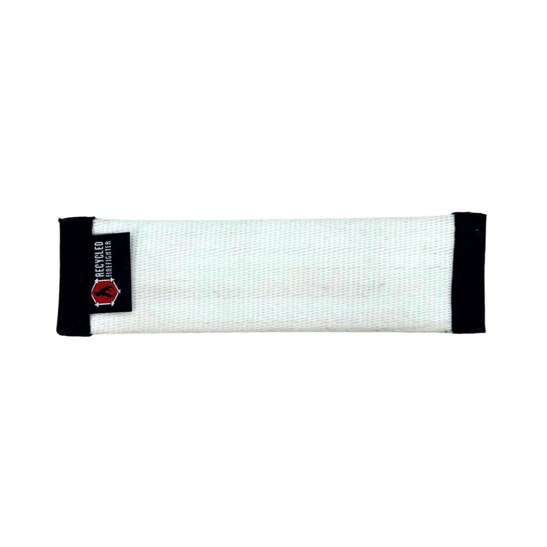 Recycled Firefighter Recycled Fire Hose Dog Fetch Toy in white and black, durable and eco-friendly for playful dogs.