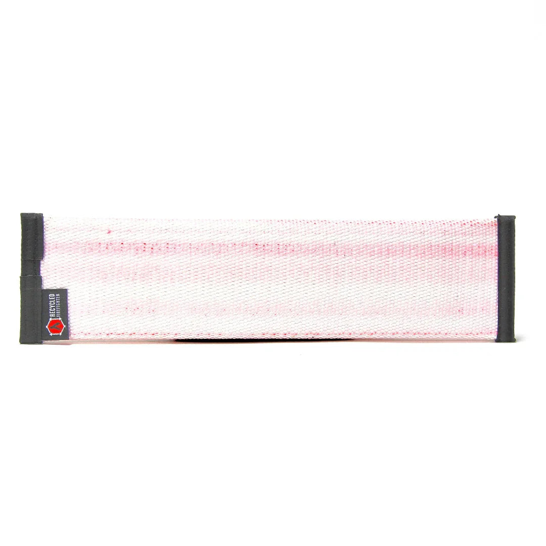 Recycled Firefighter fire hose dog fetch toy, durable and eco-friendly, designed for active dogs to play and retrieve.