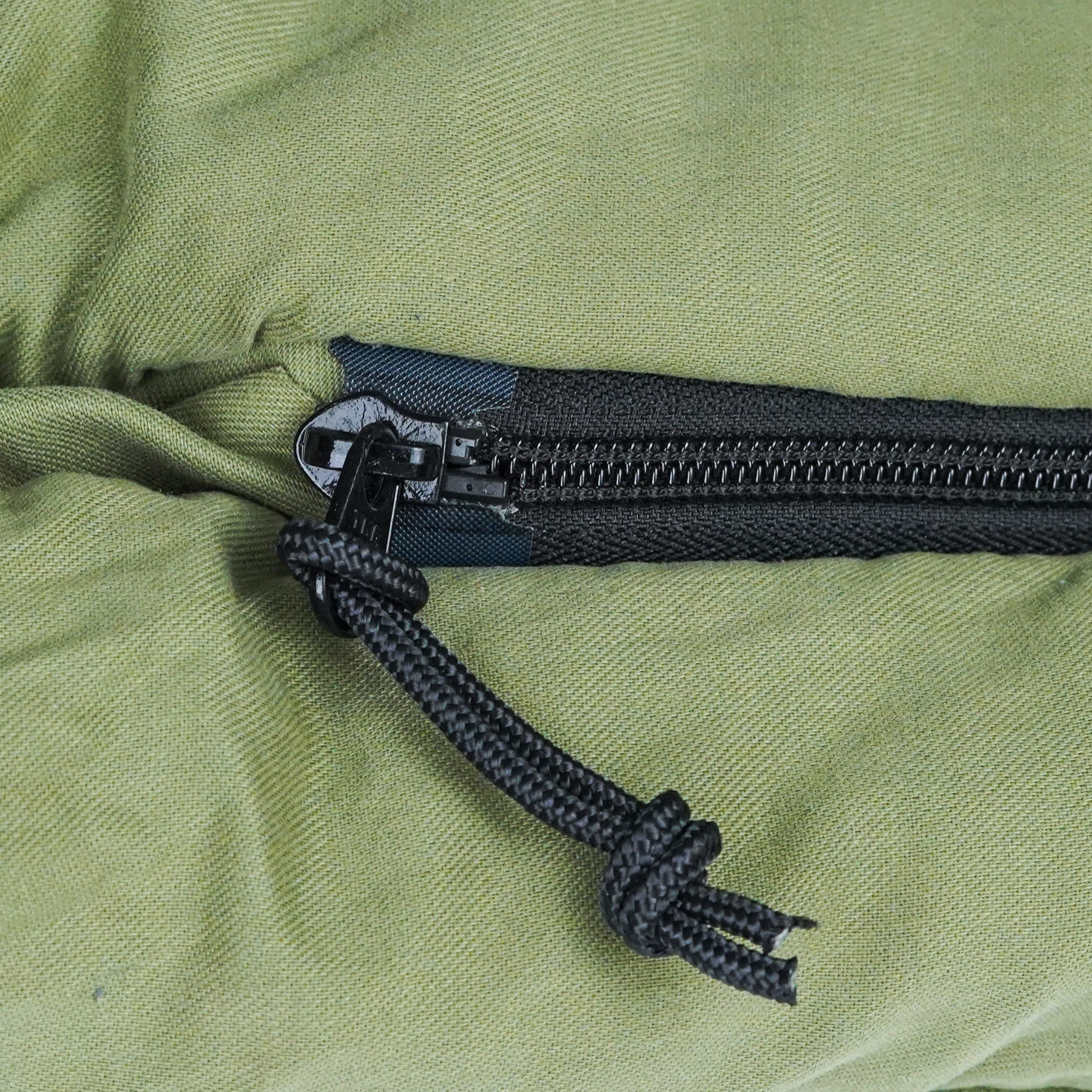 White Duck Outdoors Slumbernest™ sleeping bag in a compact, insulated design for cold weather camping, rated for 20°F.