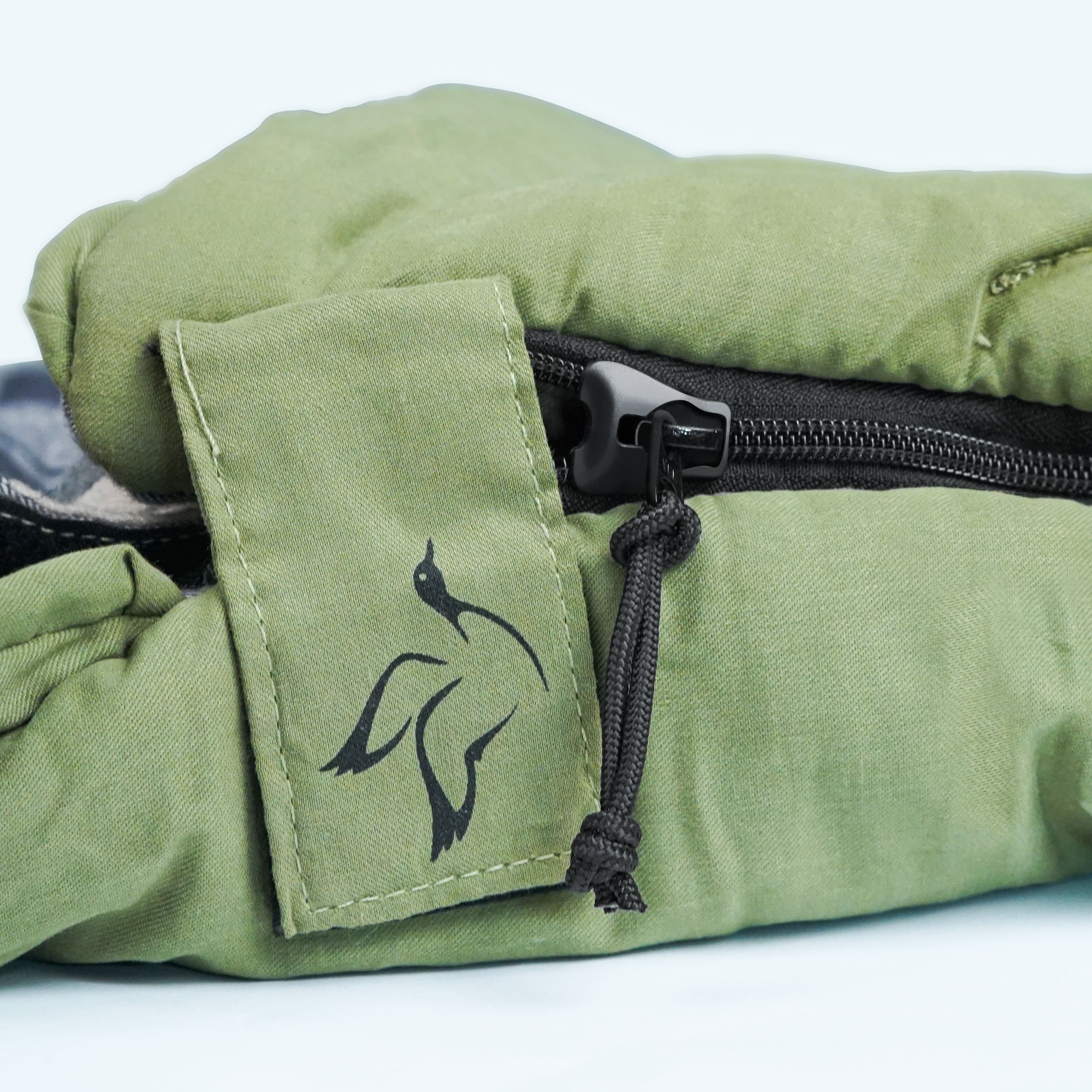 White Duck Outdoors Slumbernest™ sleeping bag rated for 50°F, shown in a cozy, insulated design suitable for outdoor camping.