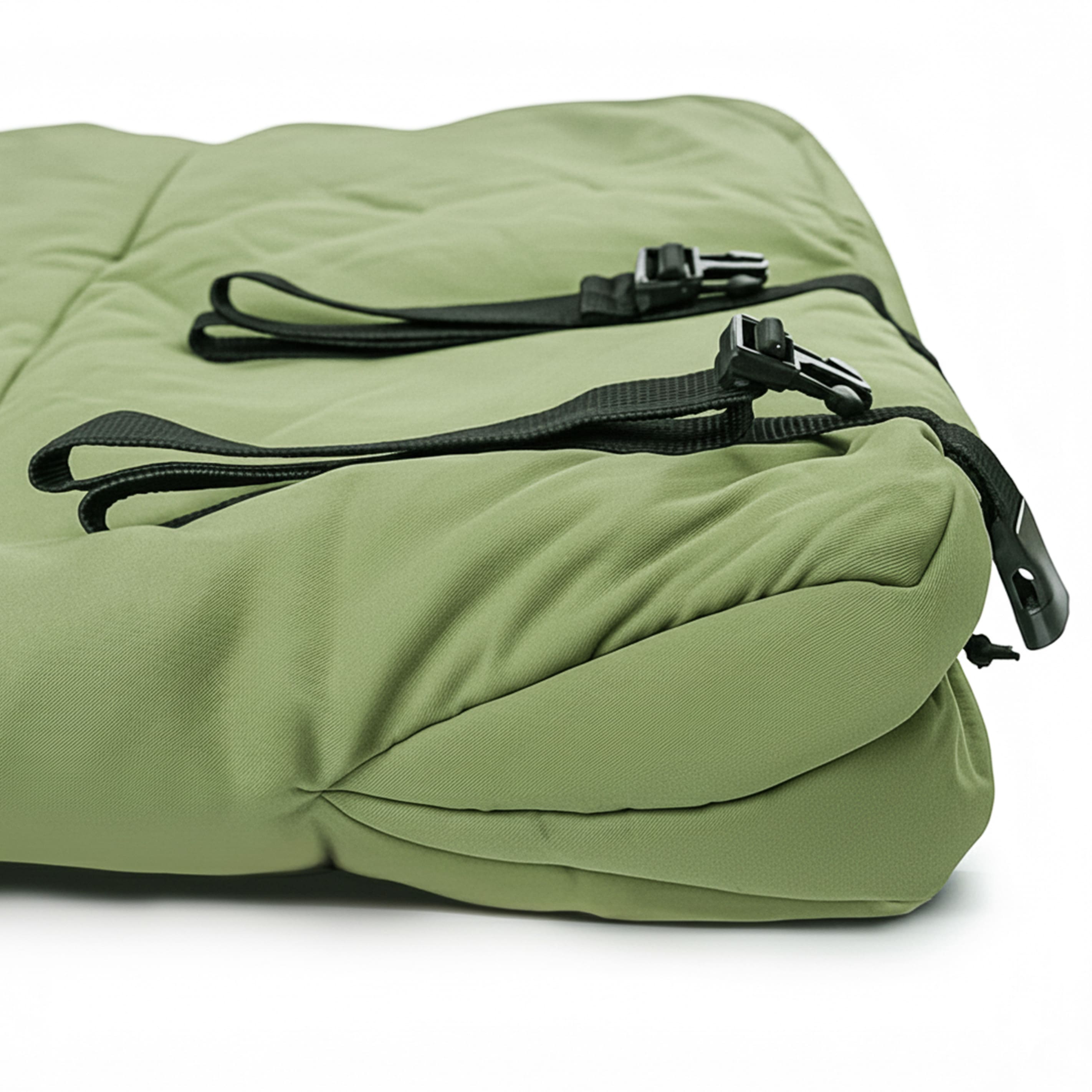 White Duck Outdoors Slumbernest™ sleeping bag, insulated and portable for camping, shown in a cozy outdoor setting
