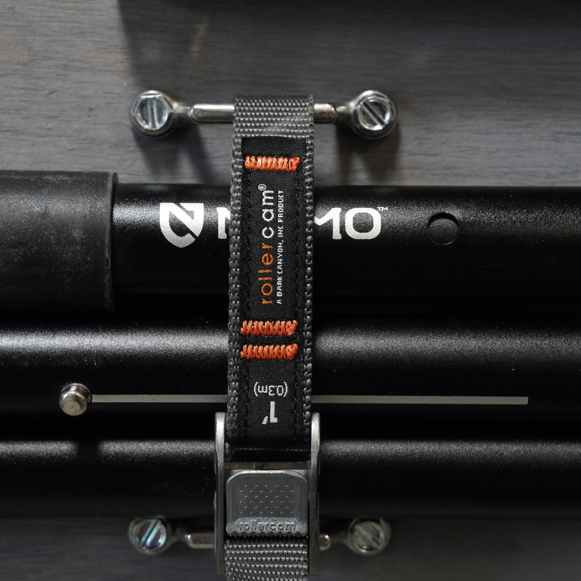 Rollercam MOLLE Kit featuring durable straps, pouches, and accessories for tactical gear organization.