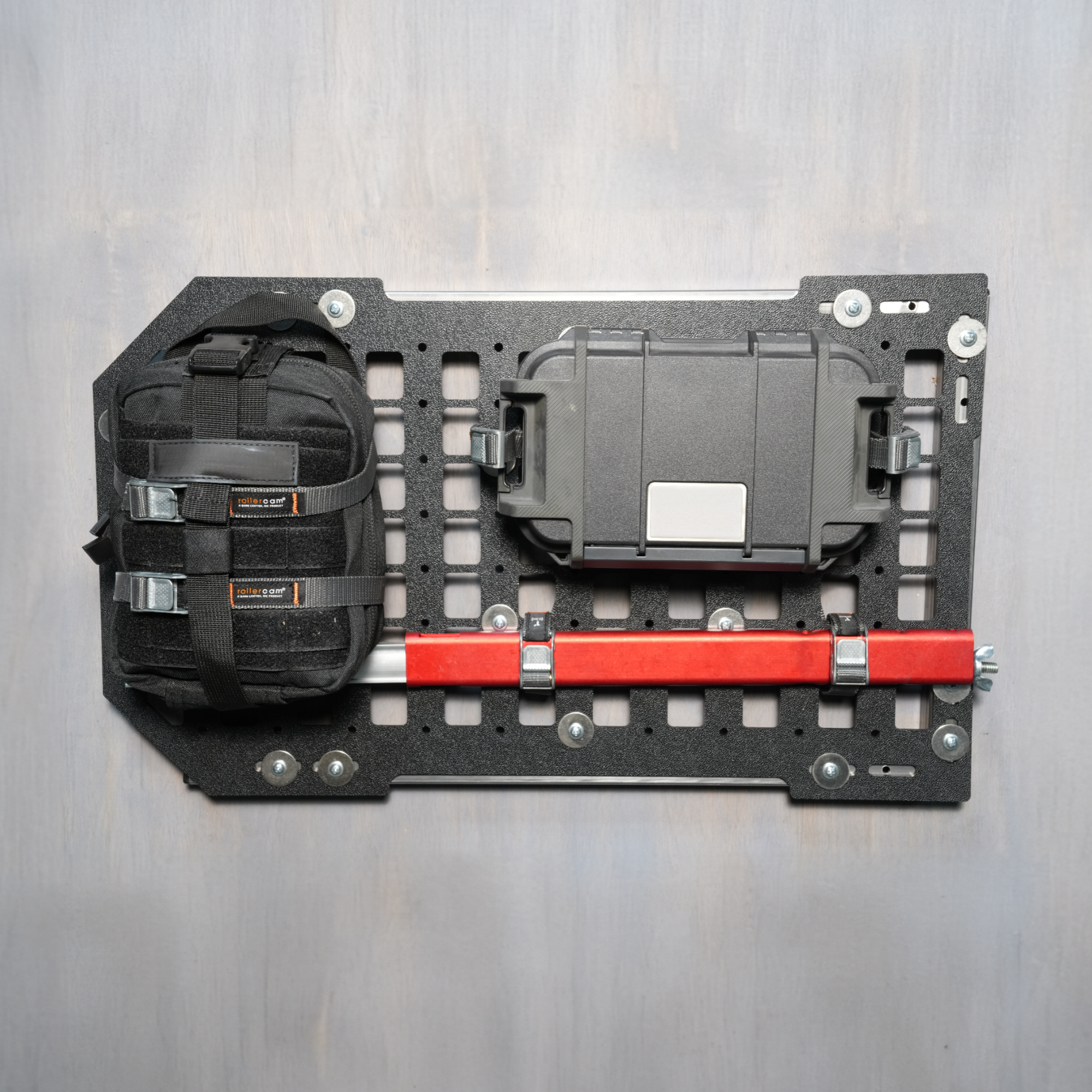 Rollercam MOLLE Kit featuring durable straps and pouches, designed for tactical gear organization and accessibility.