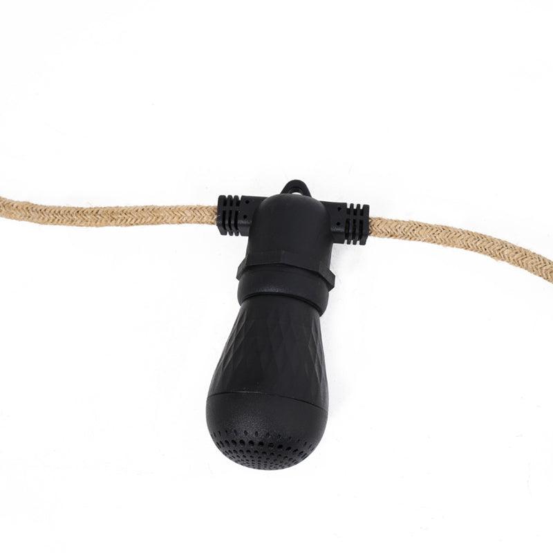 Wild Land S14 speaker light installed on a roof top tent, showing its compact design and mounting for overlanding and camping gear.