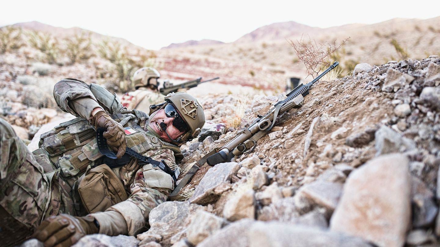 Tactical black SAM XT Extremity Tourniquet for bleeding management, with adjustable strap and quick-release buckle.