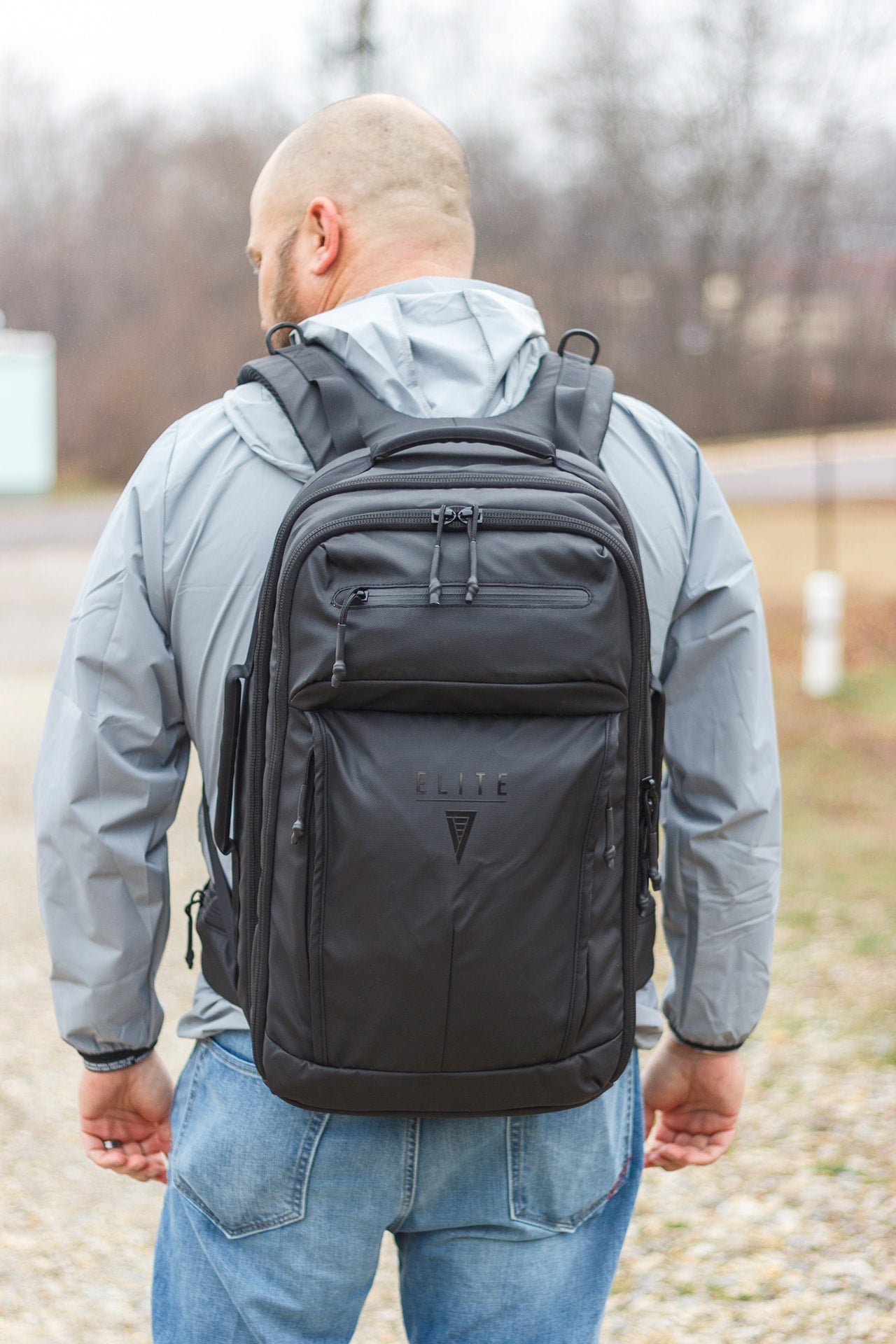 Elite Survival Systems STEALTH SBR Backpack in tactical black with multiple compartments and padded shoulder straps.