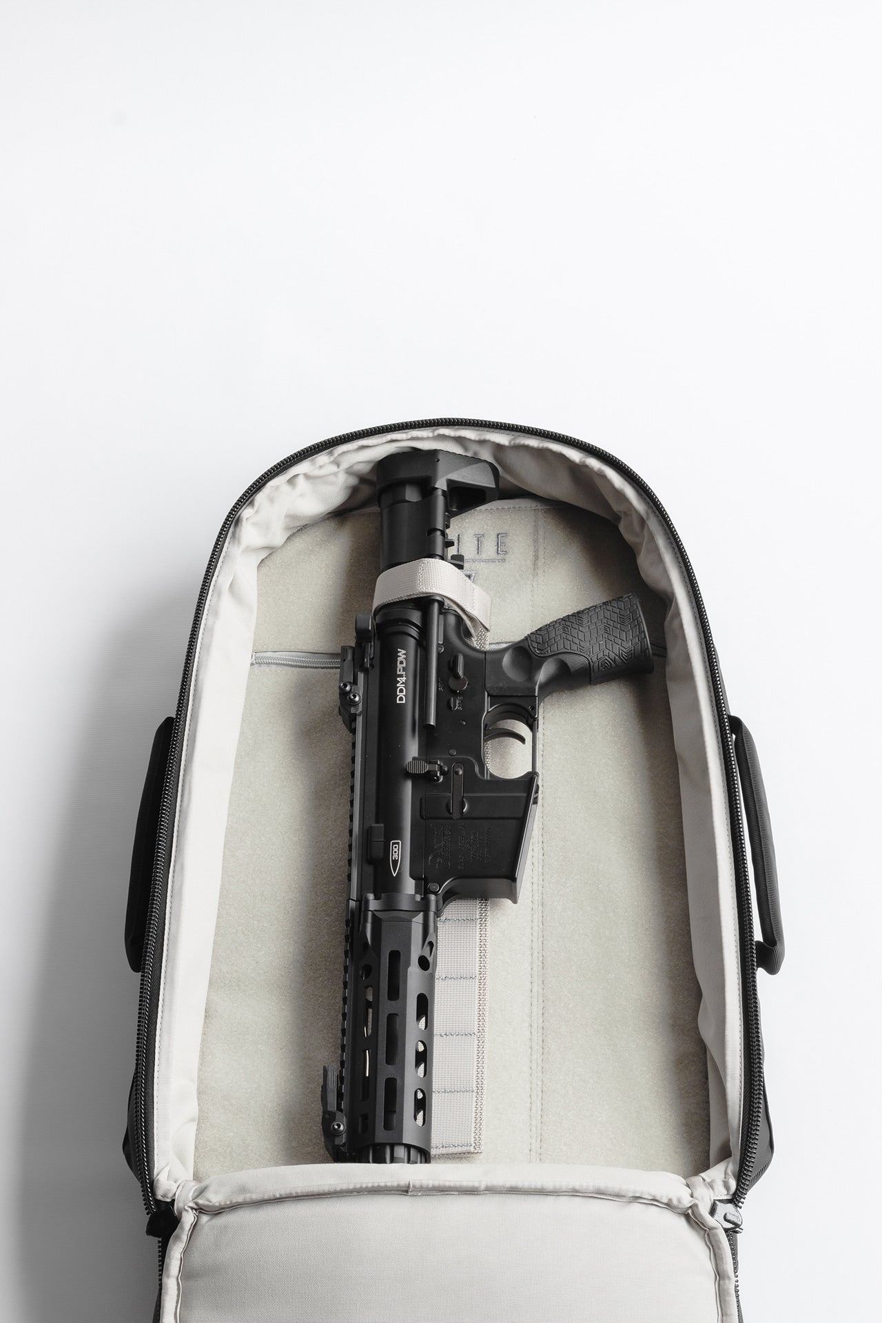 Elite Survival Systems STEALTH SBR Backpack in black, featuring multiple compartments and a sleek, tactical design.