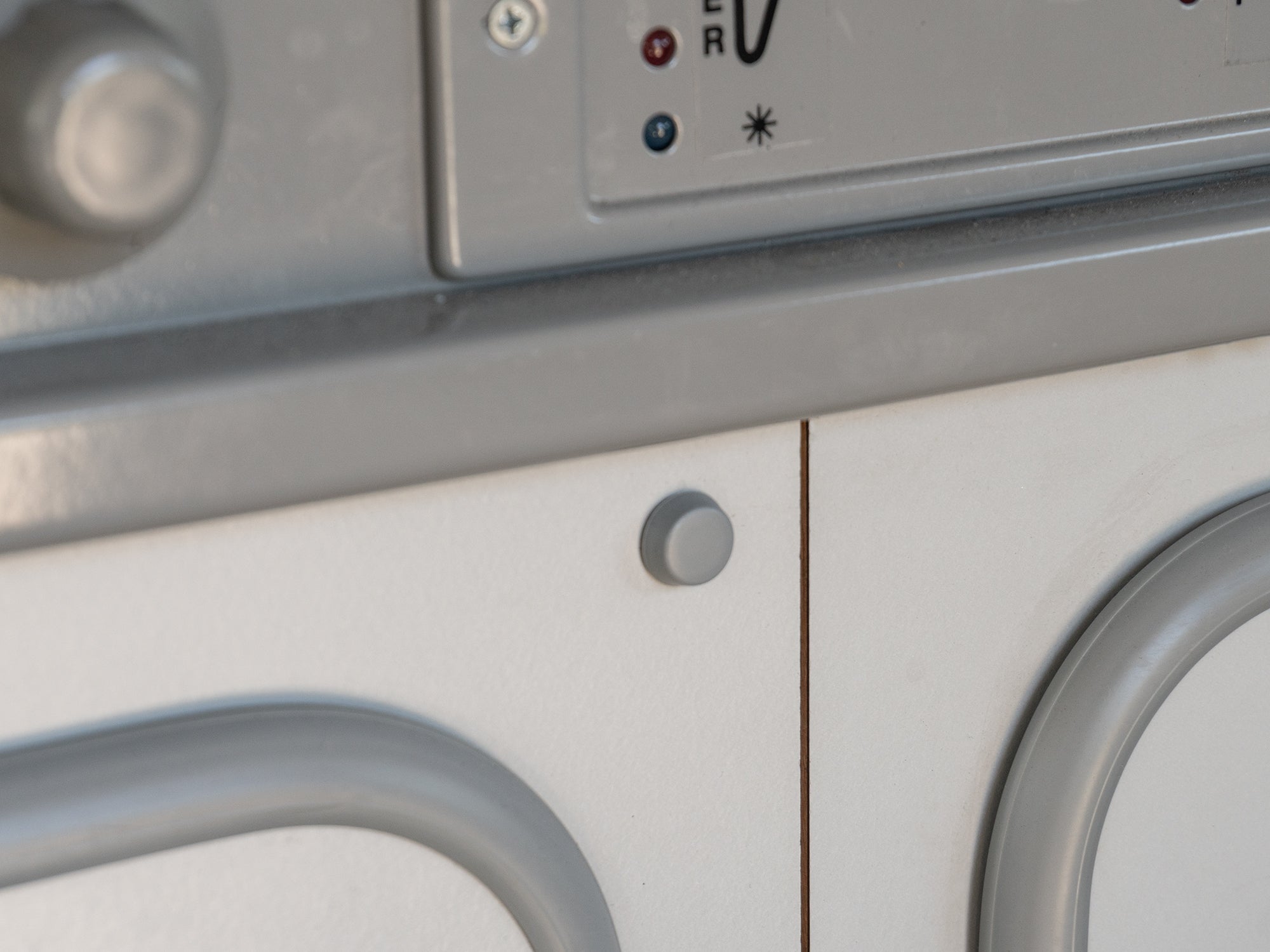 Set of five GoWesty interior screw caps for Vanagon, showing black plastic caps with a smooth, rounded design.