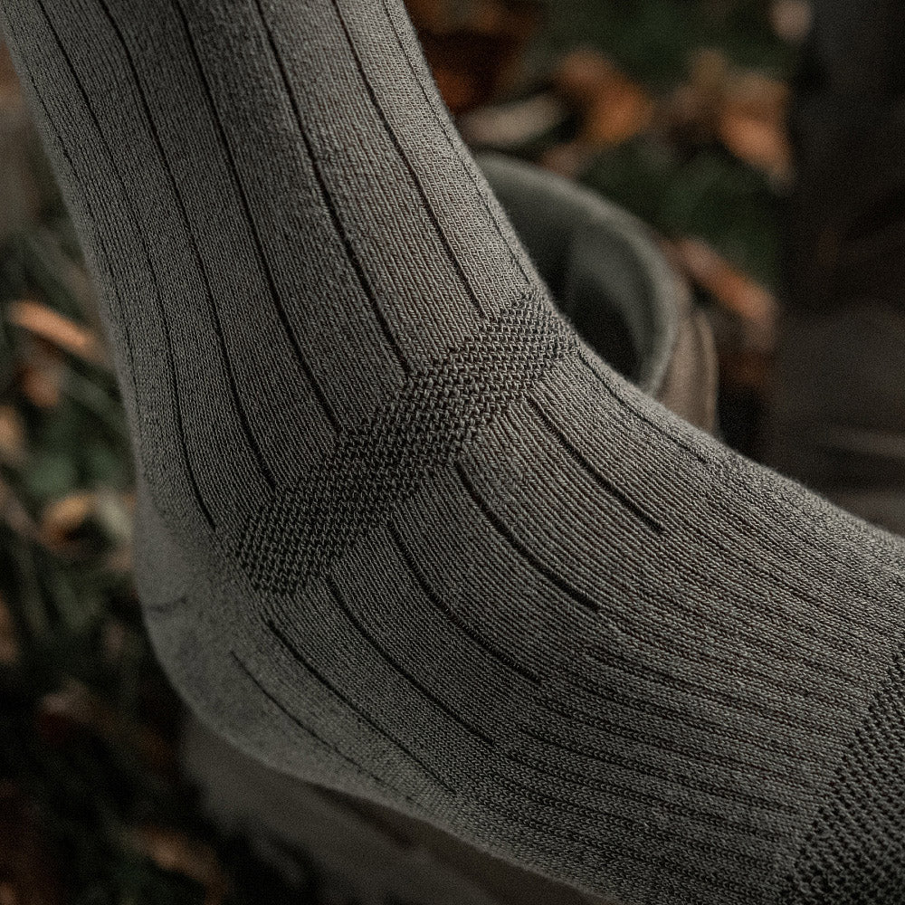 M-Tac mid calf tactical army socks in dark color, featuring reinforced toe and heel for durability and comfort.