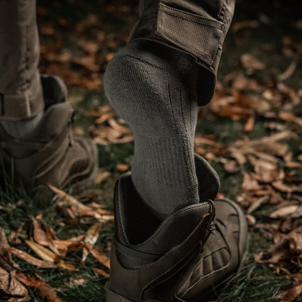 M-Tac tactical army mid calf socks in a rugged design, perfect for outdoor activities and military use.