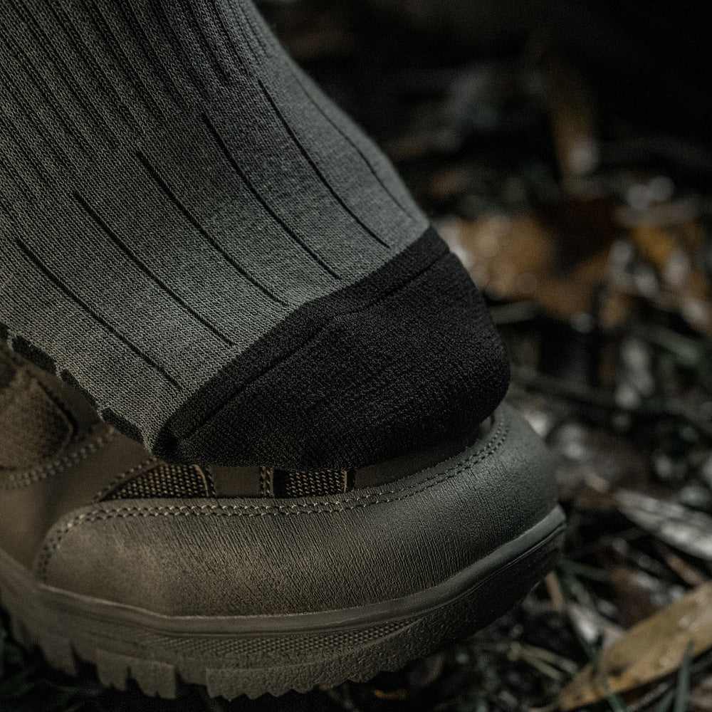 M-Tac Tactical Ranger mid calf socks in a rugged design, showcasing cushioning and moisture-wicking features.