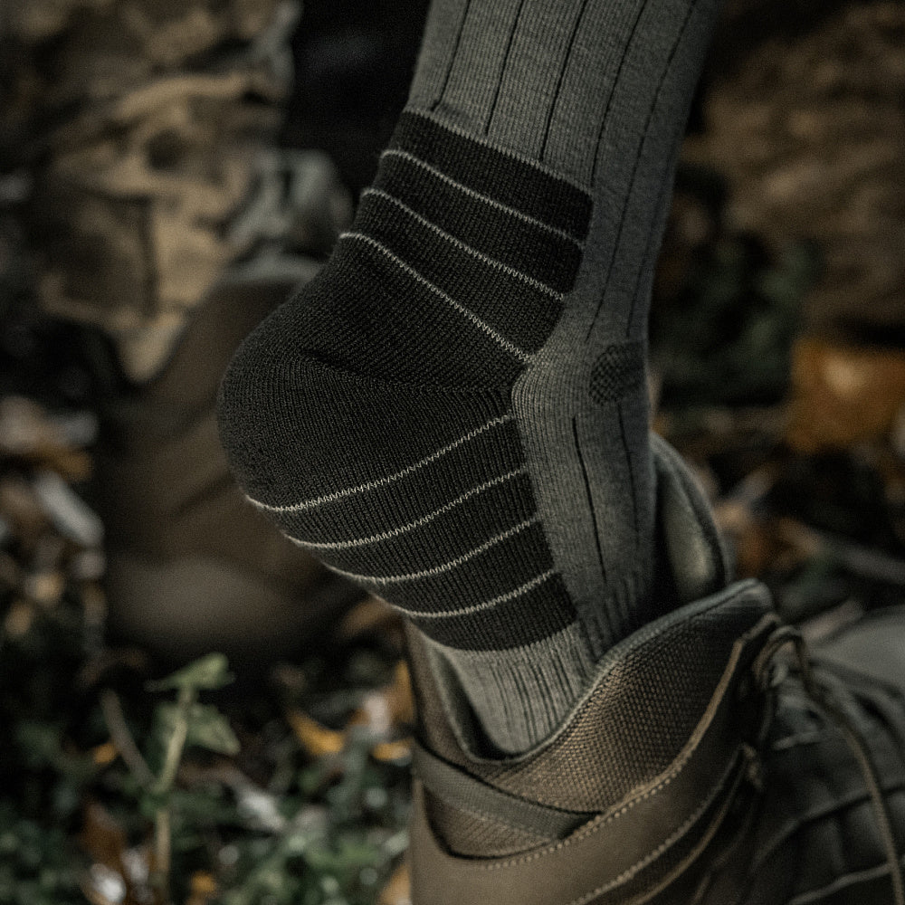 M-Tac Tactical Ranger mid calf socks in a rugged design, ideal for outdoor activities and tactical use.