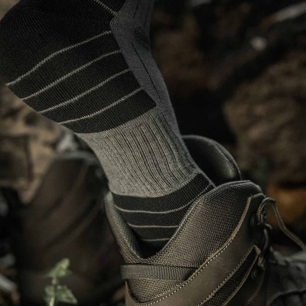 M-Tac Tactical Ranger mid calf socks in a rugged design, showcasing the fabric texture and cushioning features.