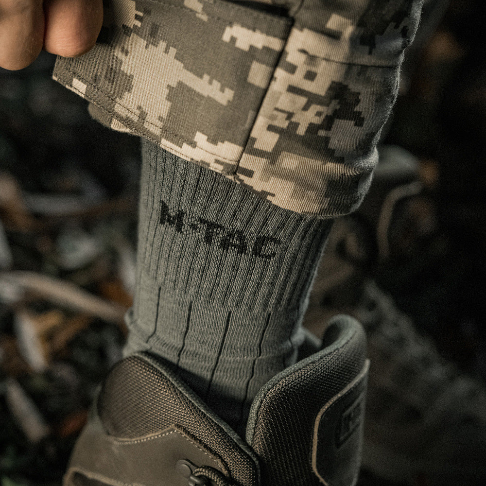 M-Tac Tactical Ranger mid calf socks in dark color, featuring a durable design suitable for outdoor and tactical use.
