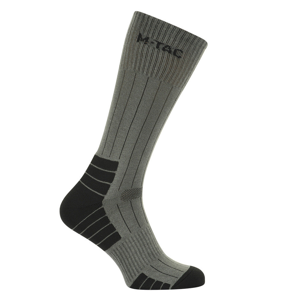 M-Tac Tactical Ranger mid calf socks in dark colors, featuring reinforced areas and moisture-wicking fabric for comfort.