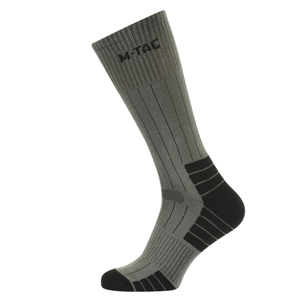 M-Tac Tactical Ranger mid calf socks in a durable fabric, featuring reinforced areas for enhanced comfort and support.