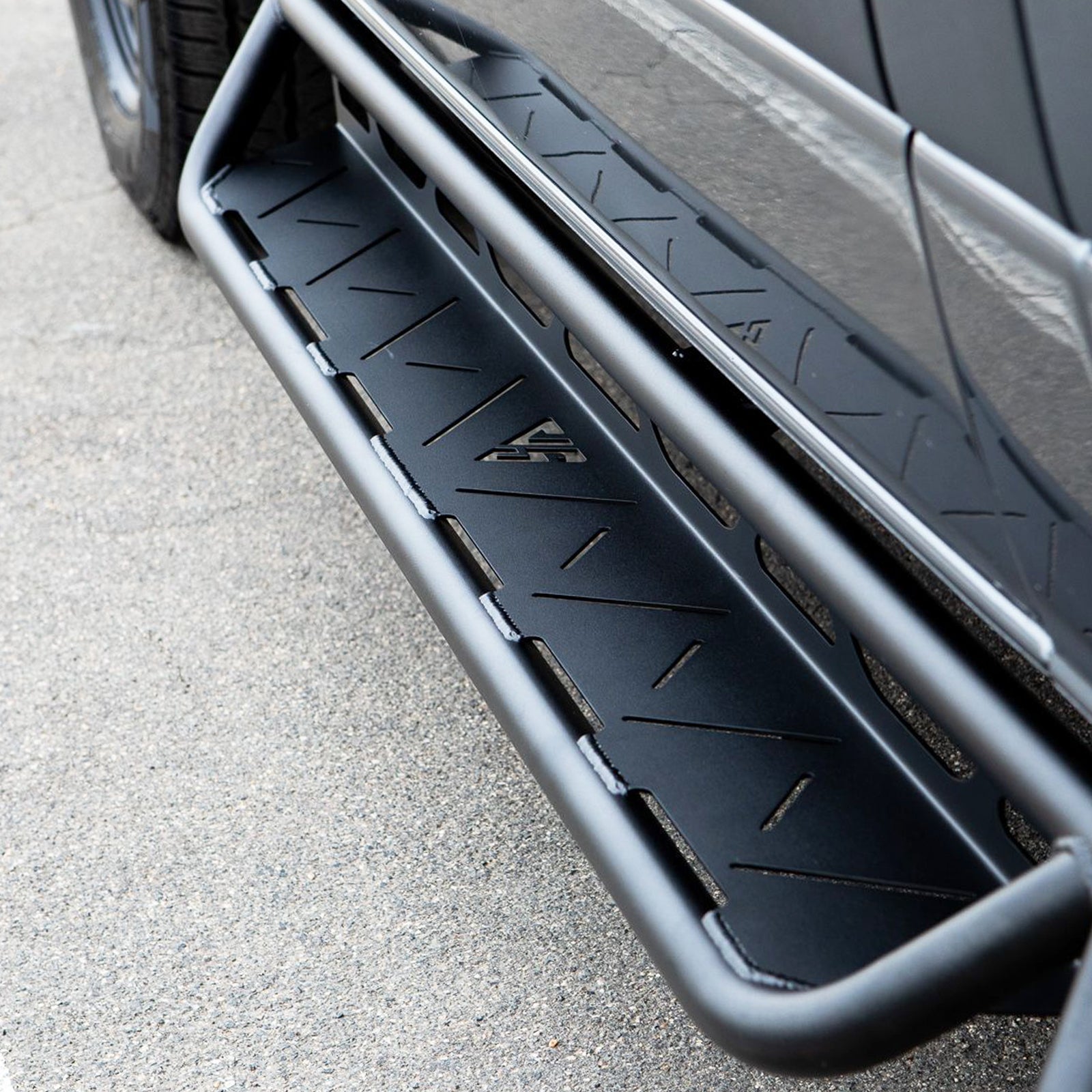 Vanspeed Sprinter side steps showcasing a sturdy design and textured surface for easy vehicle access.