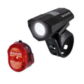 ZEITBIKE SIGMA Light BUSTER 100 bicycle power light with optional NUGGET II flash, mounted on a bicycle handlebar for visibility.