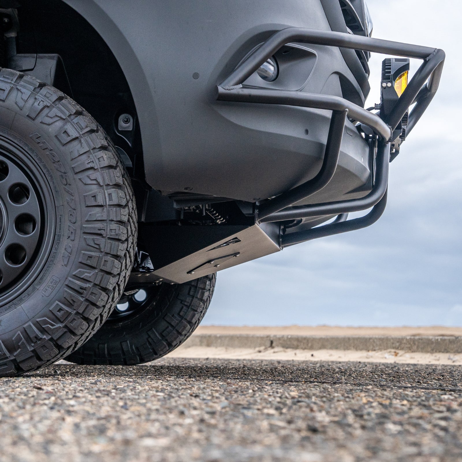 VanSpeed DIY Sprinter skid plate from The Van Mart, showcasing durable metal construction and precise fit for van protection.