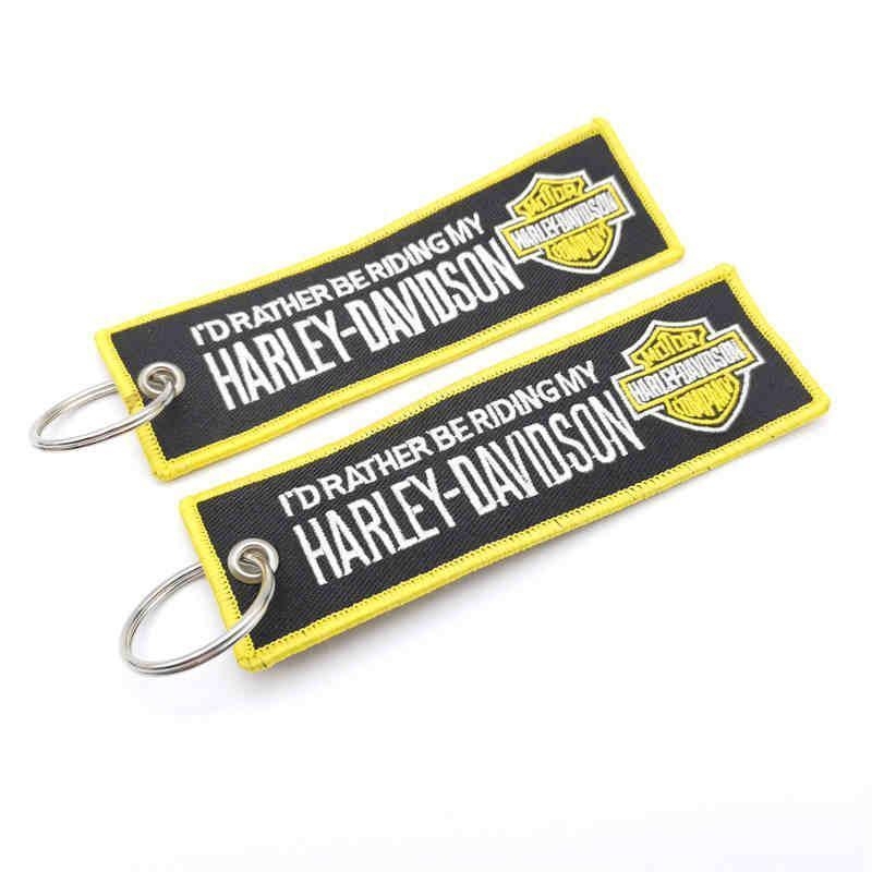 Embroidered motorcycle brand keychain by Bean's Moto Booth, decorative accessory with detailed motorcycle logo embroidery.