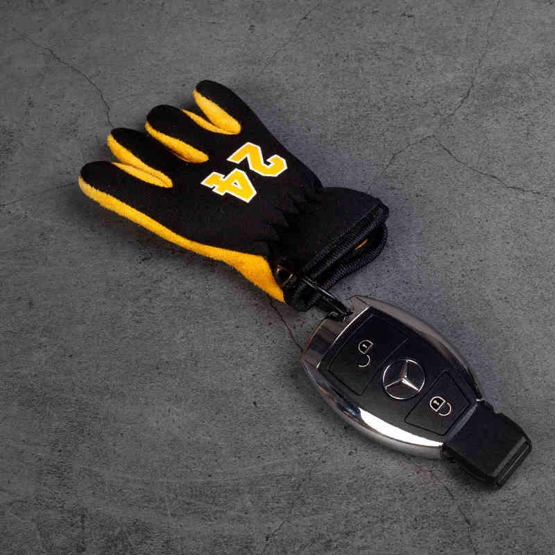 Vintage leather motorcycle glove keychain decor by FEISHDEK™ featuring handcrafted leather and metal details from Bean's Moto Booth.