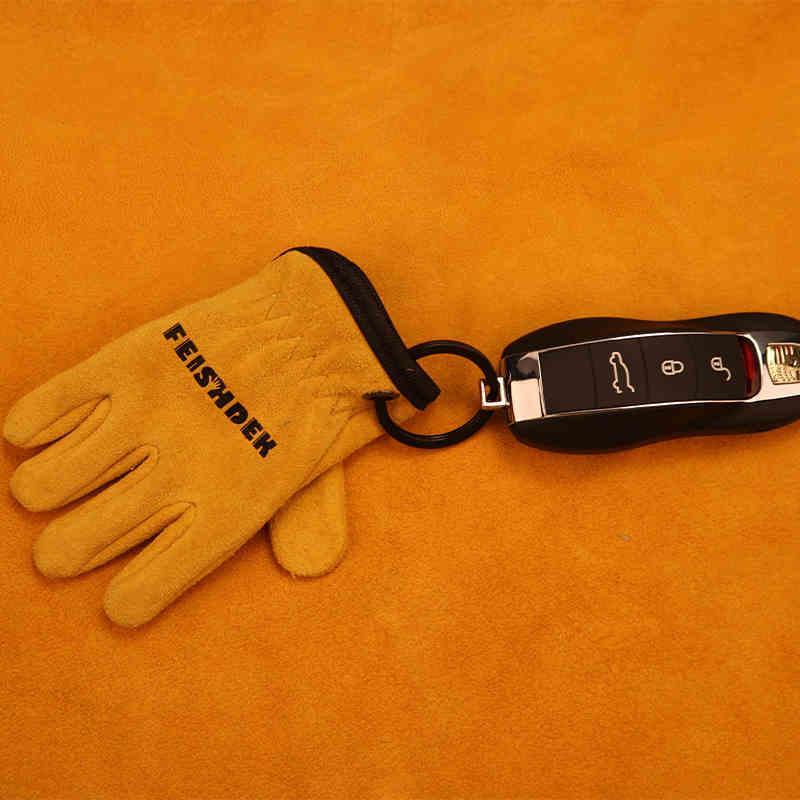 Vintage handcrafted leather motorcycle glove keychain from FEISHDEK™ with decorative motorcycle glove design, by Bean's Moto Booth.