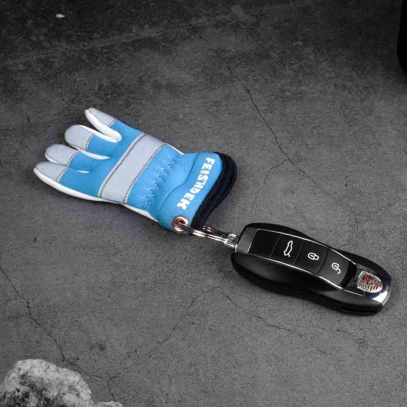Vintage handcrafted leather motorcycle glove keychain from Feishdek by Bean's Moto Booth, displayed as a decorative accessory.