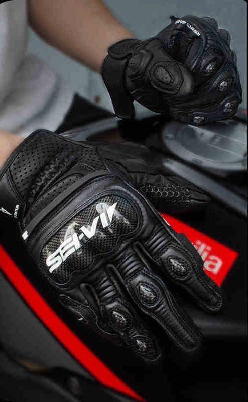 SEIVI™ motorcycle carbon fiber leather gloves with reinforced knuckles and adjustable wrist straps, designed for safety and style.