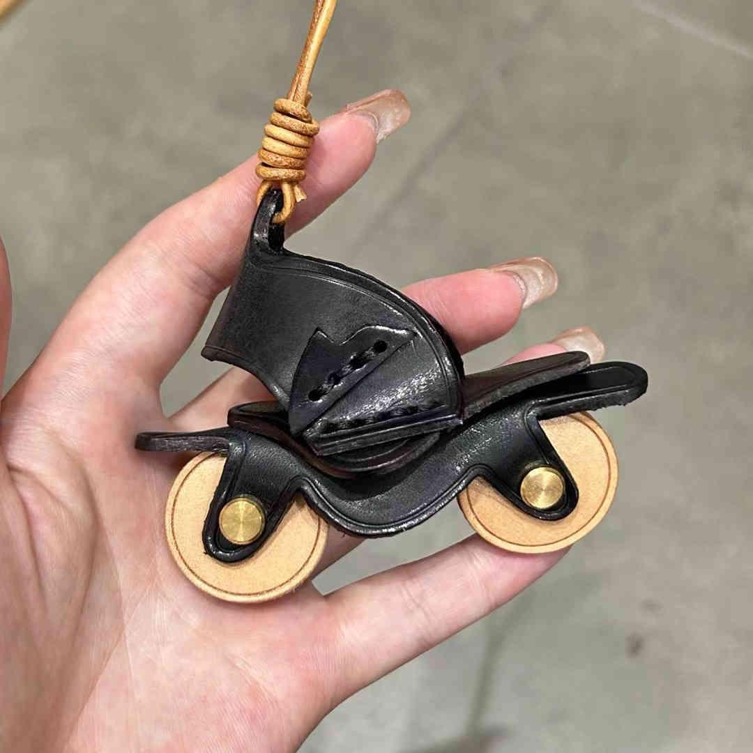 Handcrafted genuine leather motorcycle pendant decor with detailed design, ideal for motorcycle enthusiasts and home decor.