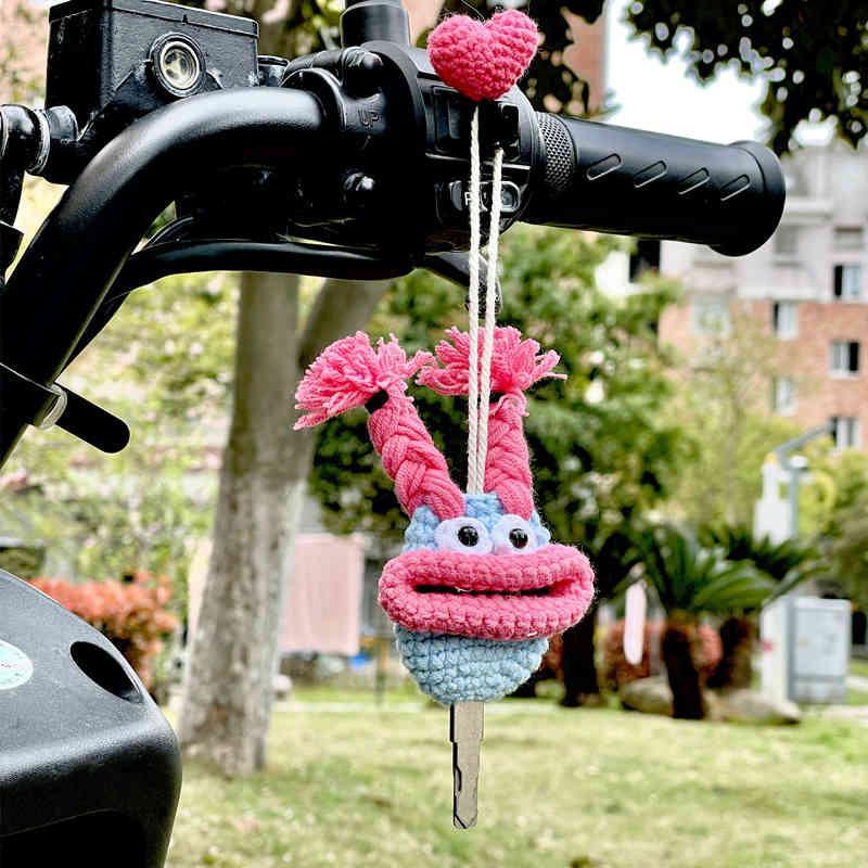 Decorative motorcycle key cover by Bean's Moto Booth featuring quirky, cute design for motorcycle keys.