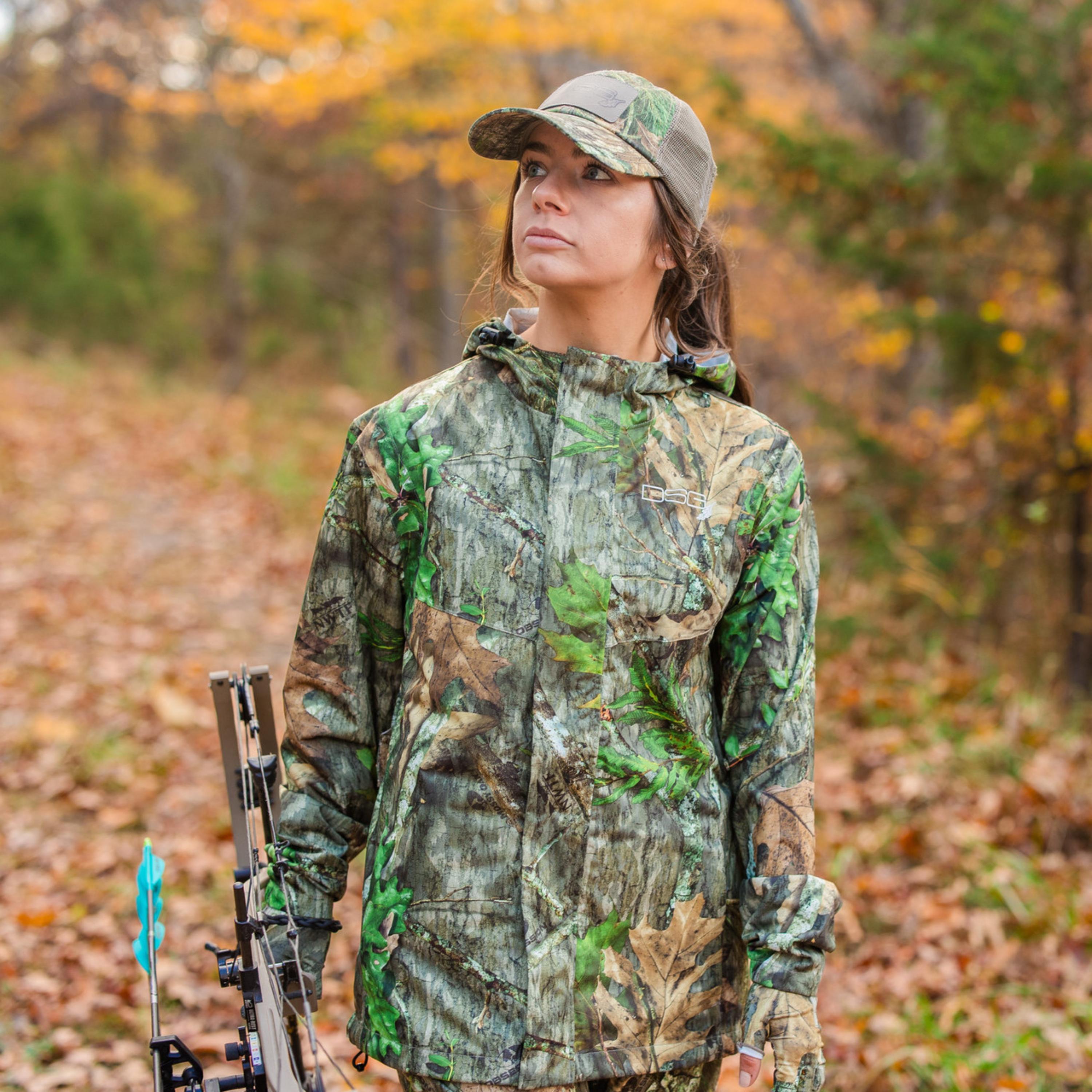 DSG OUTERWEAR Nova rain jacket in black, lightweight waterproof outerwear with hood and adjustable cuffs, outdoor gear for wet weather