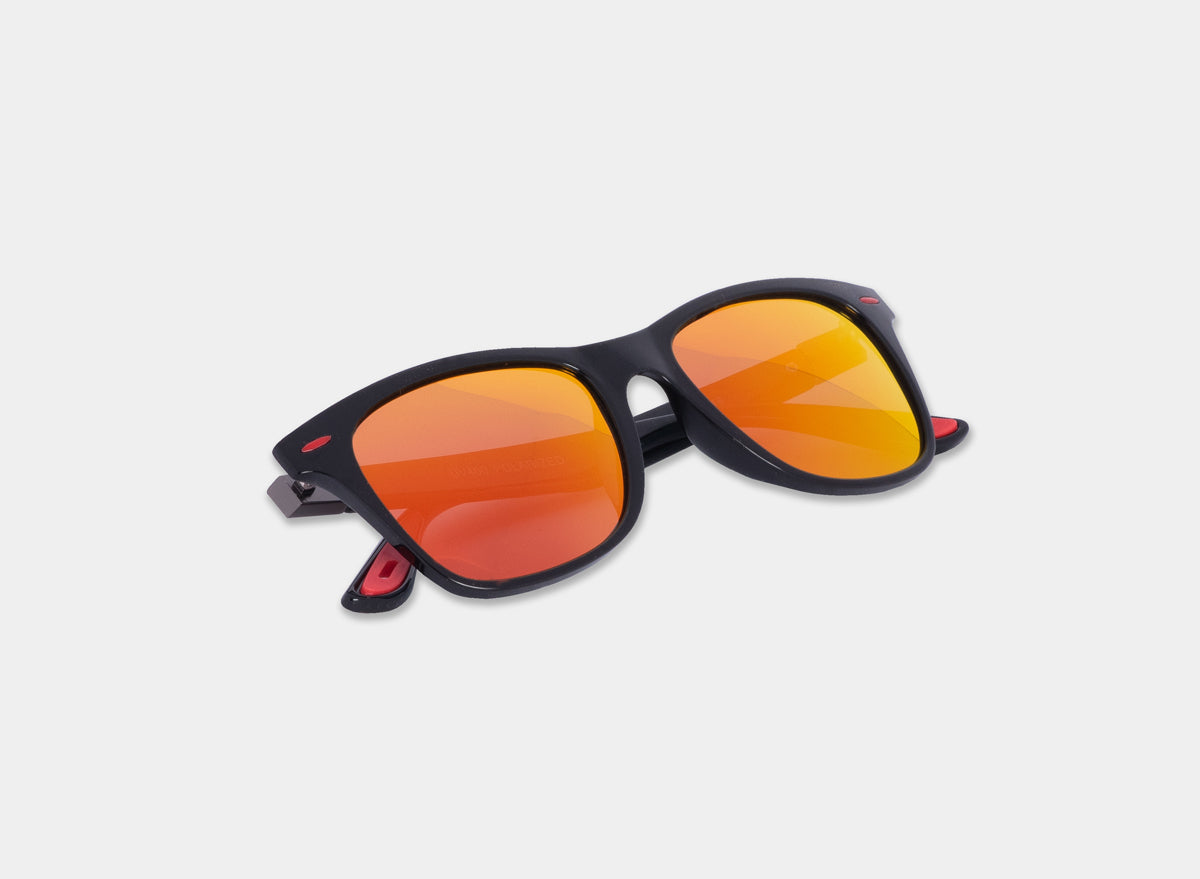 Red sport sunglasses by Eastern Outer featuring sleek frames and tinted lenses, ideal for active outdoor activities.
