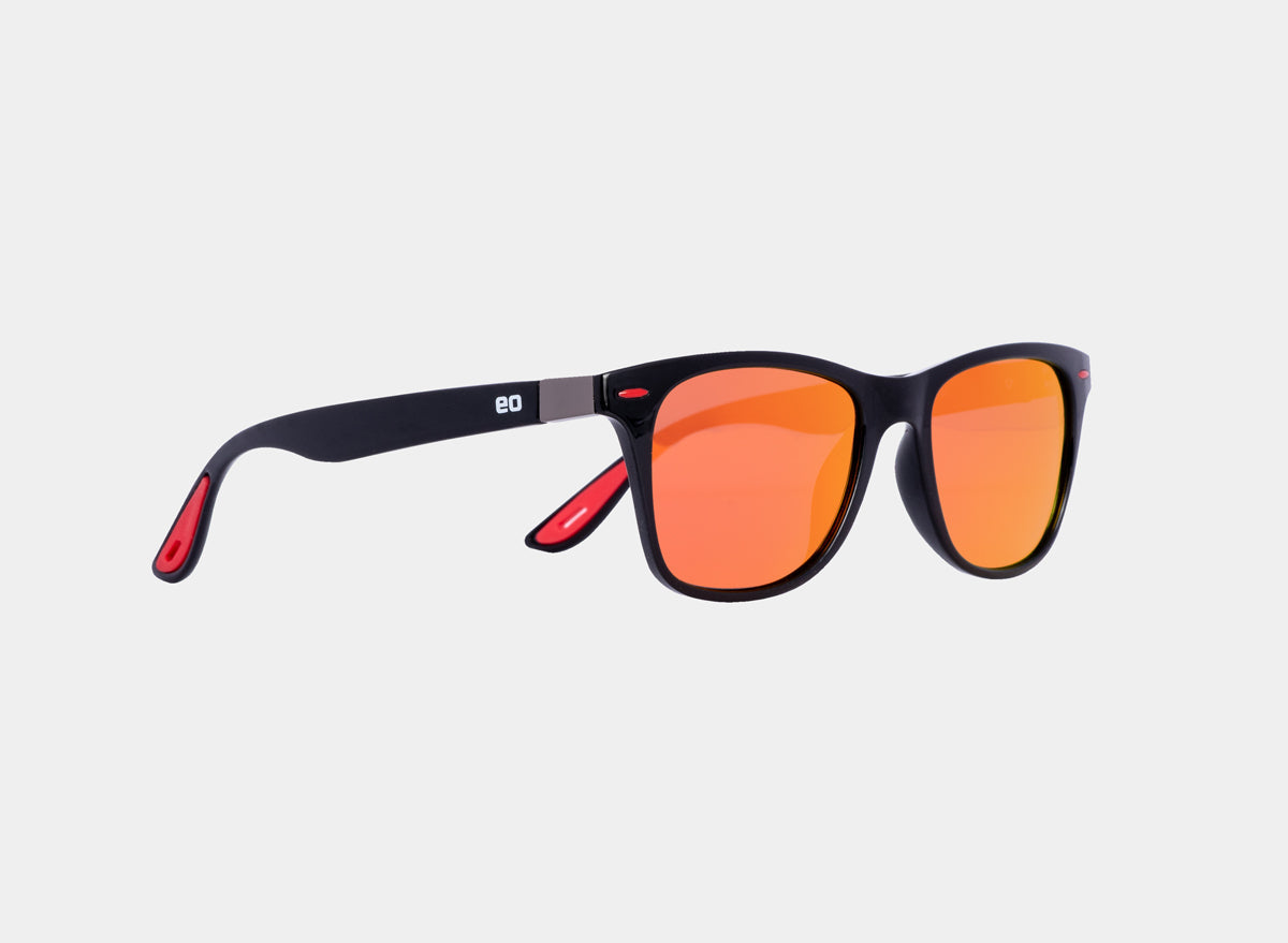 Red sport sunglasses by Eastern Outer with sleek frame and tinted lenses, designed for active outdoor use.