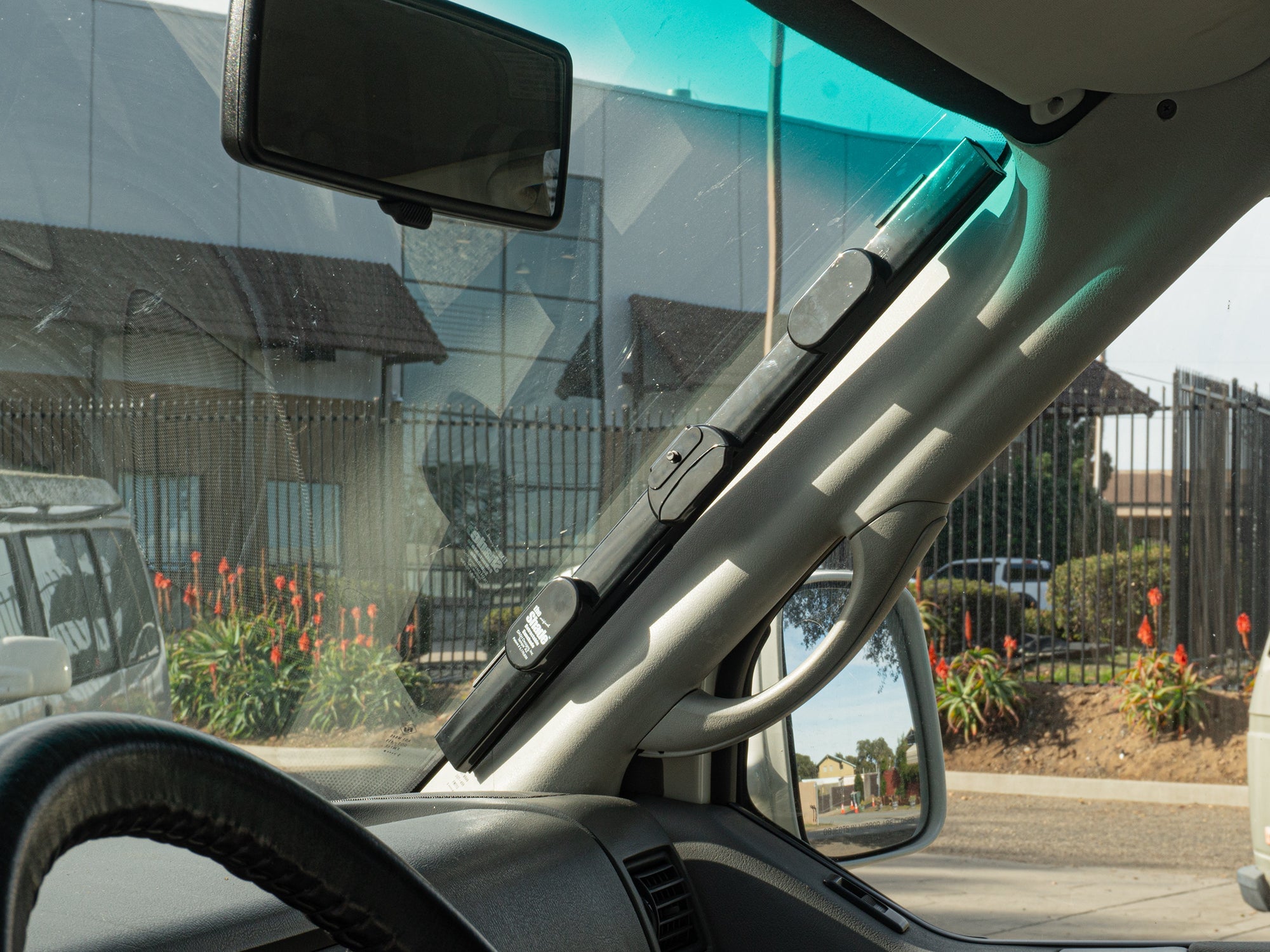 GoWesty retracting sun and privacy shade installed inside a Bus/Vanagon/Eurovan for sun protection and privacy.