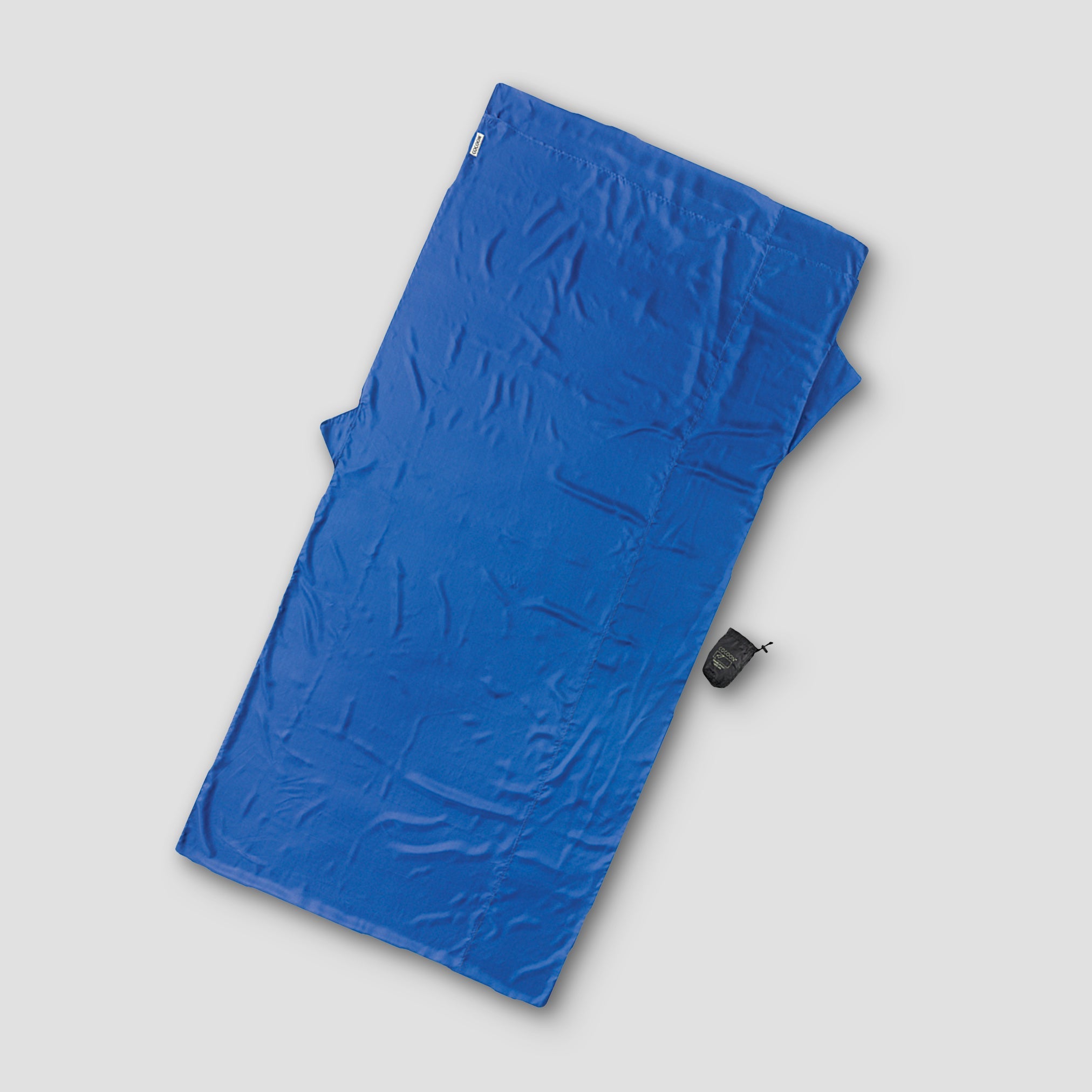 Cocoon Travelsheet Silk XL in natural silk fabric, extra large size, designed for comfortable travel and outdoor use.