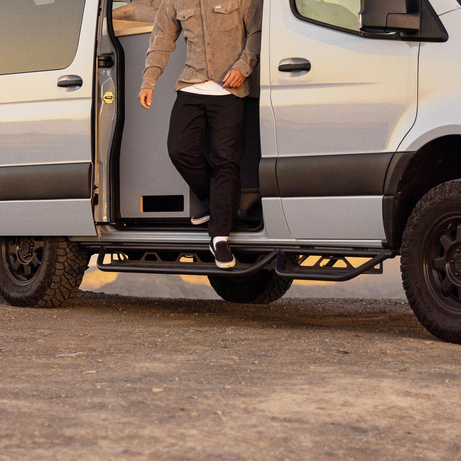 Vanspeed Sprinter side steps displayed on a van, showcasing sleek design and sturdy construction for easy access.