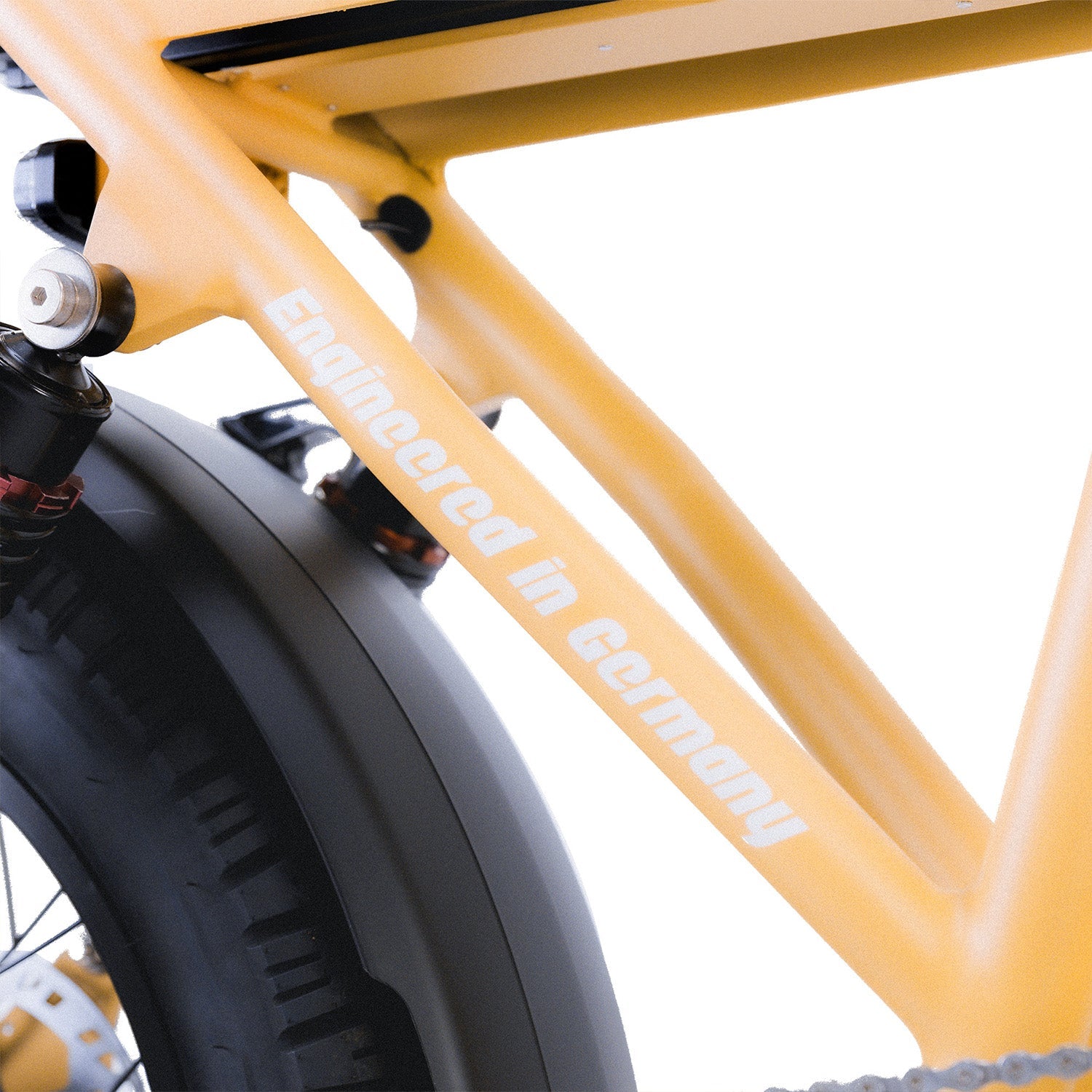 ZEITBIKE Super Strada NOMAD sports utility e-bike with a sleek frame, off-road tires, and modern handlebars in a sandy color.